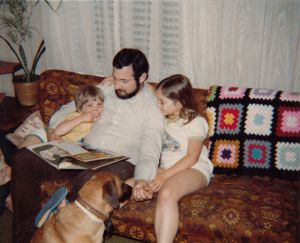 Me with my dad, little brother David, and our dog, Hector.